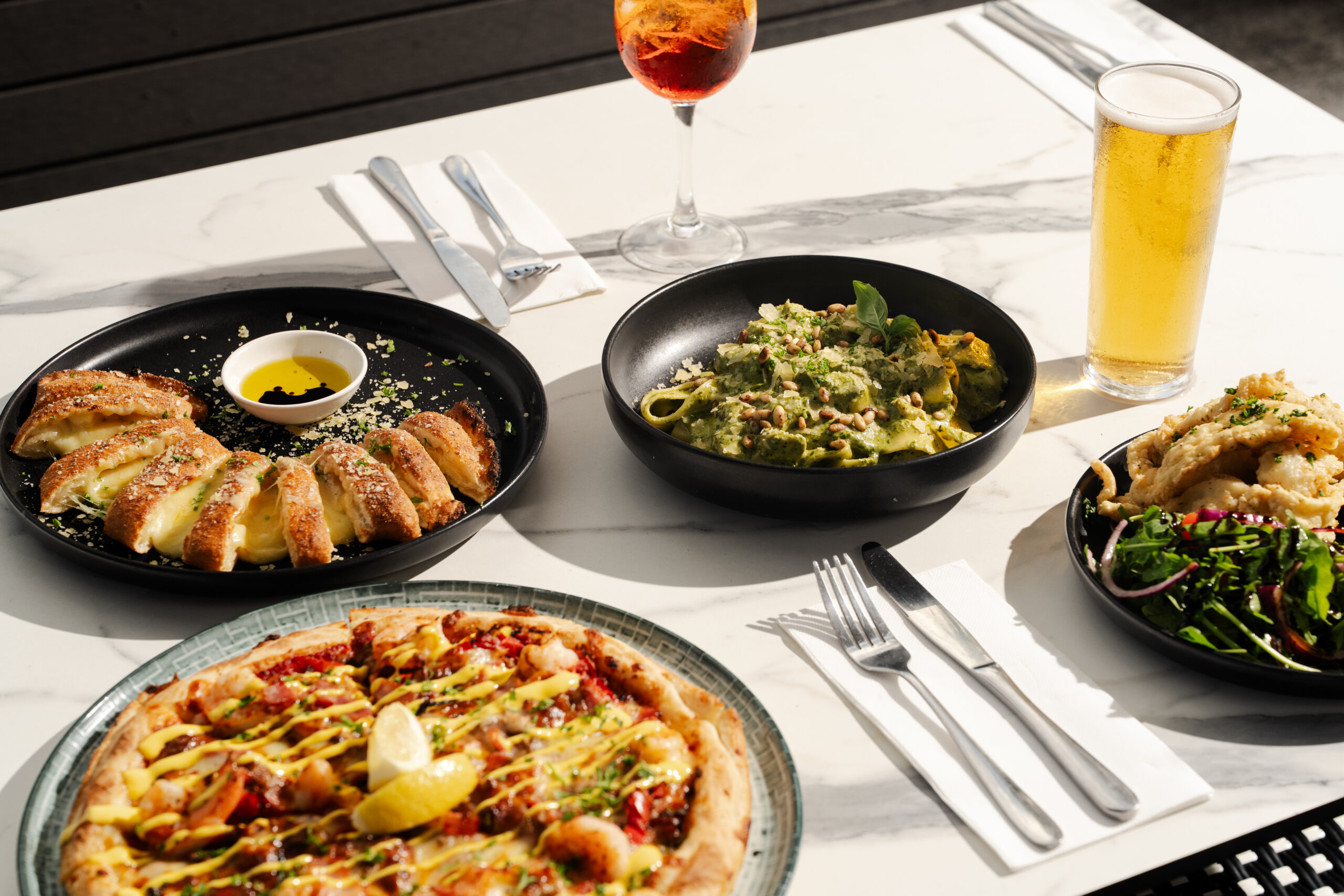 Your new go-to destination for long lunches, shared plates, and unforgettable food.